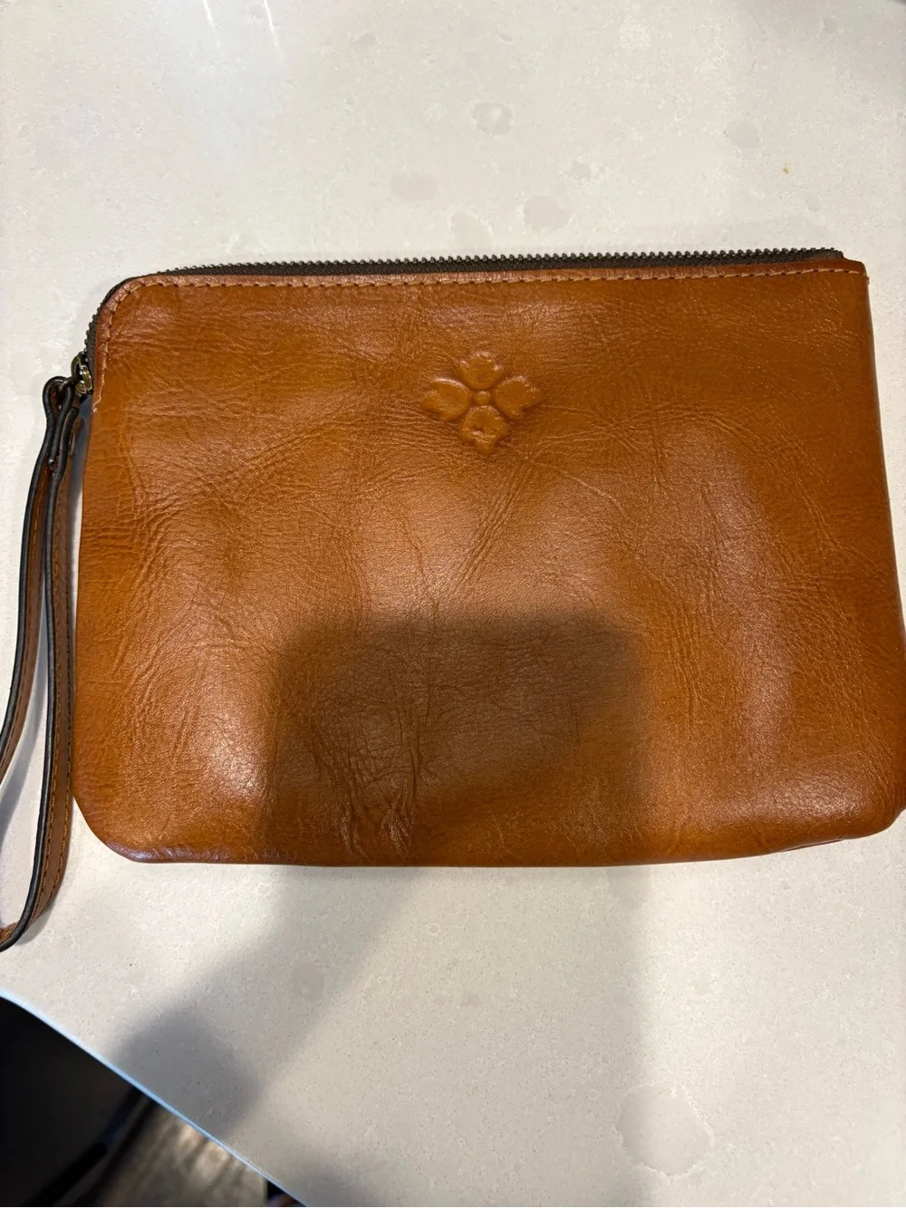 Embossed Leather Wristlet Clutch in Cognac Brown